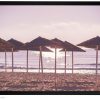 Летен морски пейзаж, морска фотография - изгрев край чадърите Летен морски пейзаж, морска фотография - изгрев край чадърите